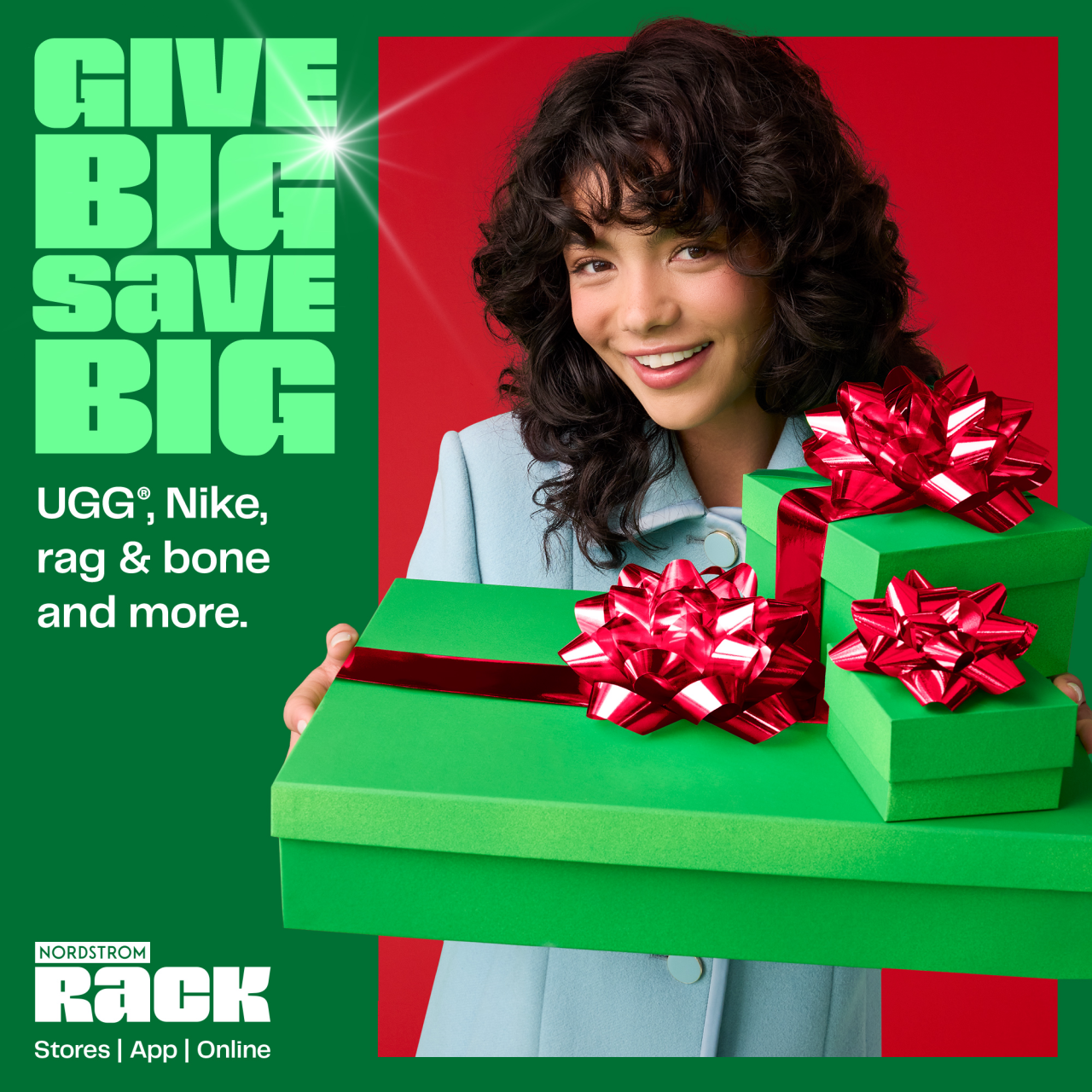 A smiling woman in a light blue coat holds green gift boxes with red bows in front of a red background. Text reads, "GIVE BIG SAVE BIG. UGG, Nike, rag & bone and more. Nordstrom Rack Stores | App | Online.