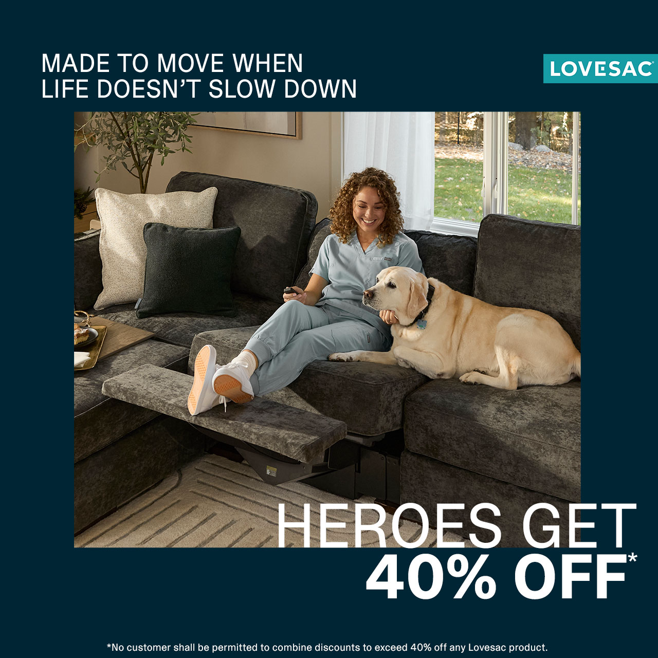 A smiling woman lounges on a dark gray sectional sofa with an extended footrest, petting a golden retriever. Text reads, “Made to move when life doesn’t slow down. Heroes get 40% off.” Loveseat brand logo is in the corner.