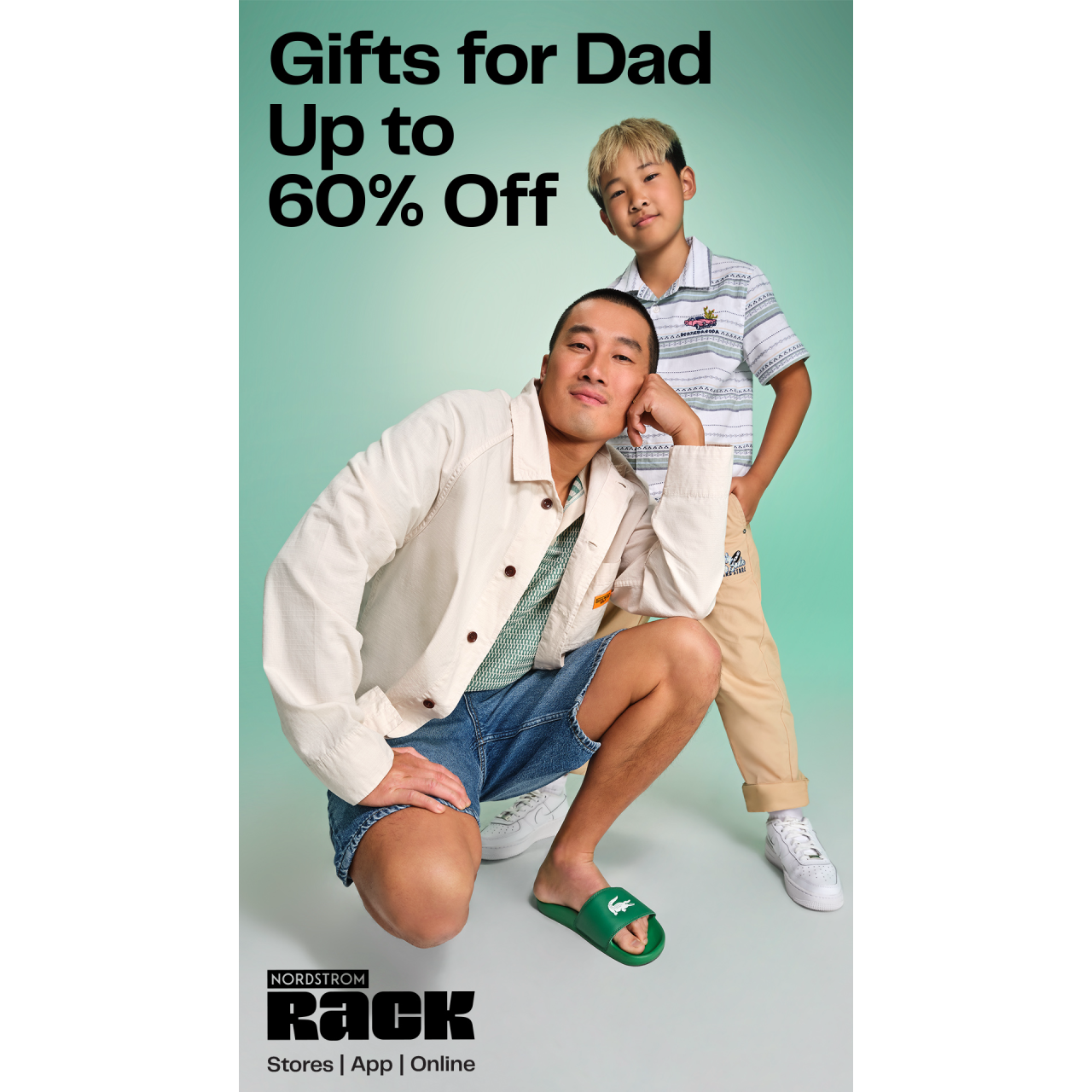 A man crouches next to a smiling boy standing on a green gradient background. Text reads: “Gifts for Dad Up to 60% Off. NORDSTROM RACK. Stores | App | Online.” Both wear casual outfits.